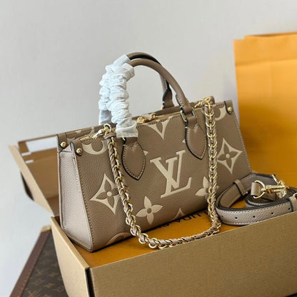 Louis Vuitton On The Go East West - Dove Cream with LV monogram