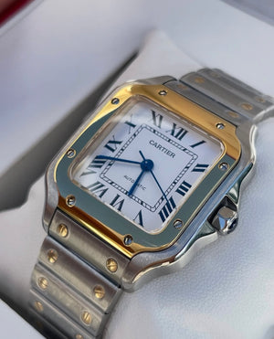 Santos de Cartier dos tonos esfera blanca tamaño mediano