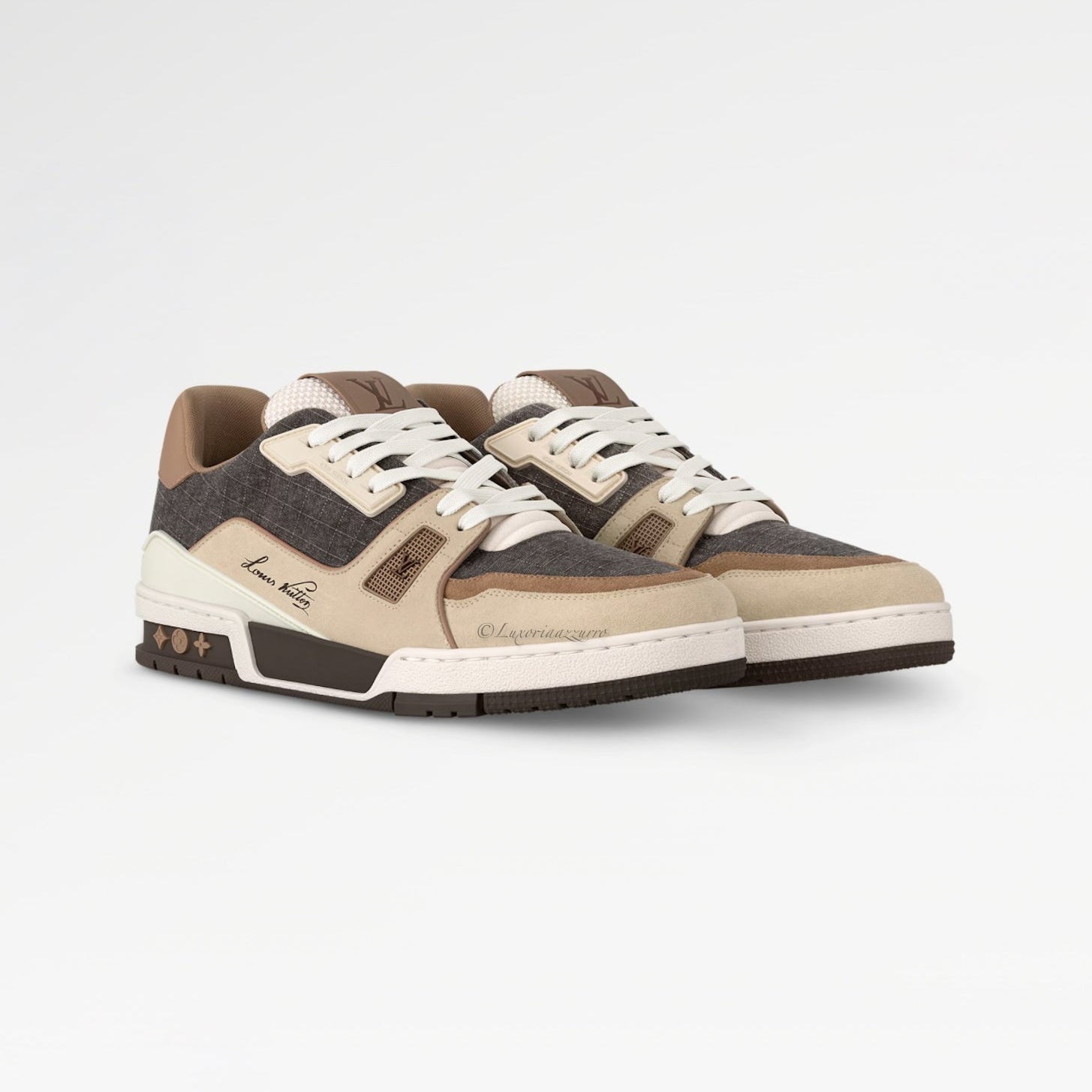 Pair of brown and beige sneakers on a white background
