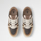 Pair of Louis Vuitton sneakers on a light gray background